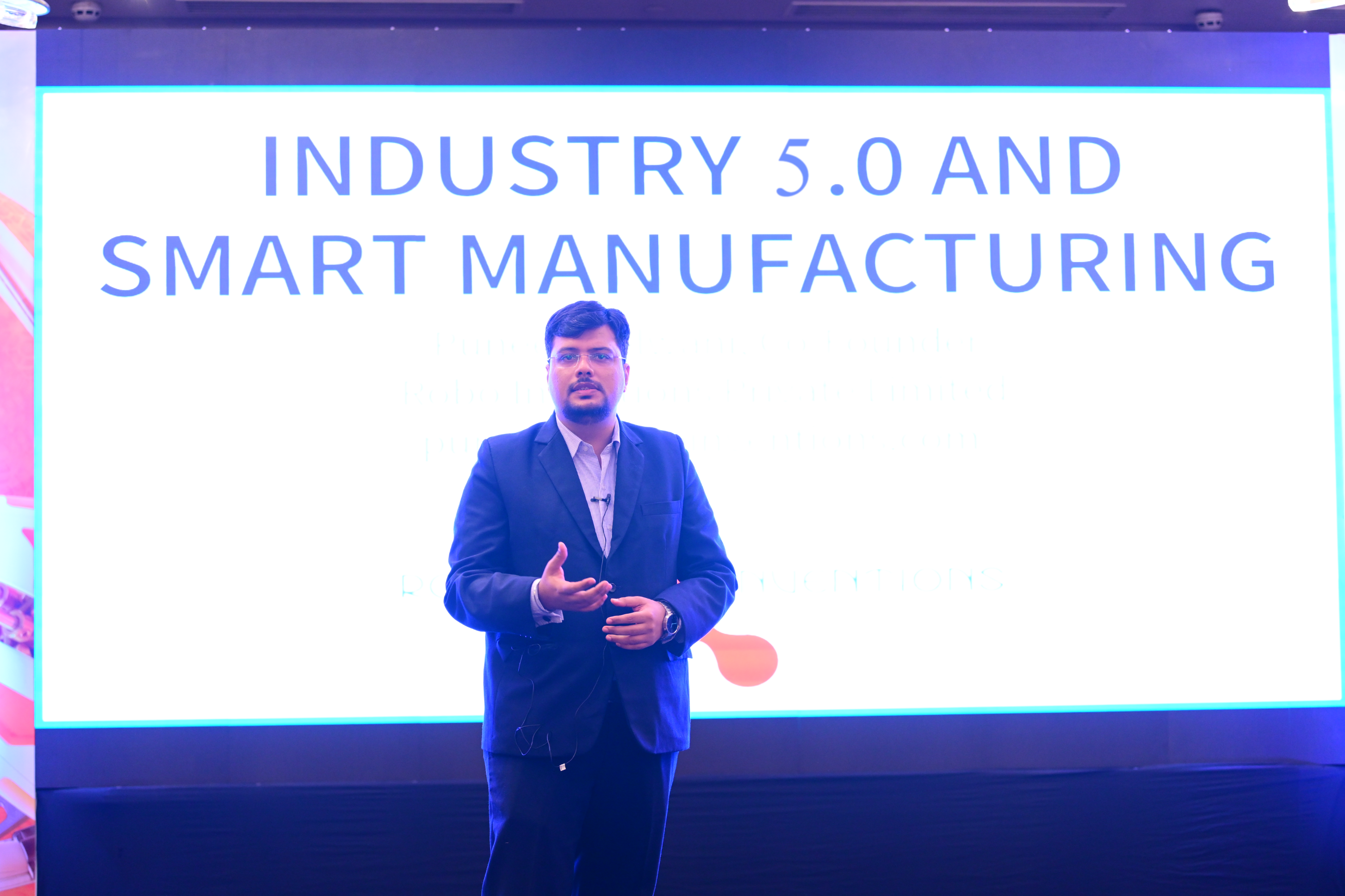 Puneet Melwani presenting robotics and factory automation strategy